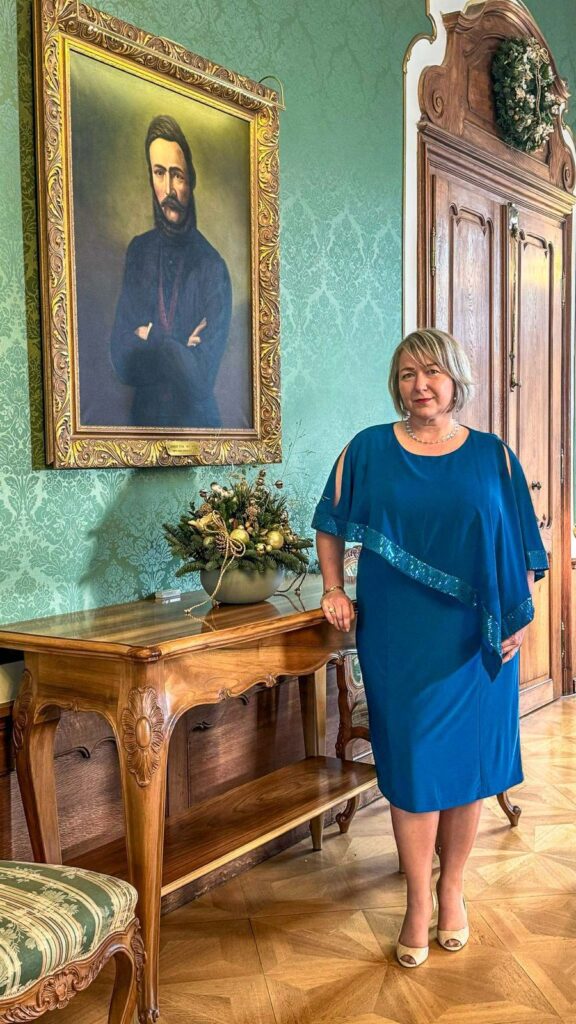 Livia Ludhova in the Presidential Palace in Bratislava next to a portrait of the Slovak politician and writer Ľudovít Štúr (photo/©: private)