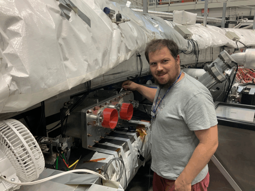 Dr. René Reimann working on the Muon g-2 storage ring (photo/©: private)